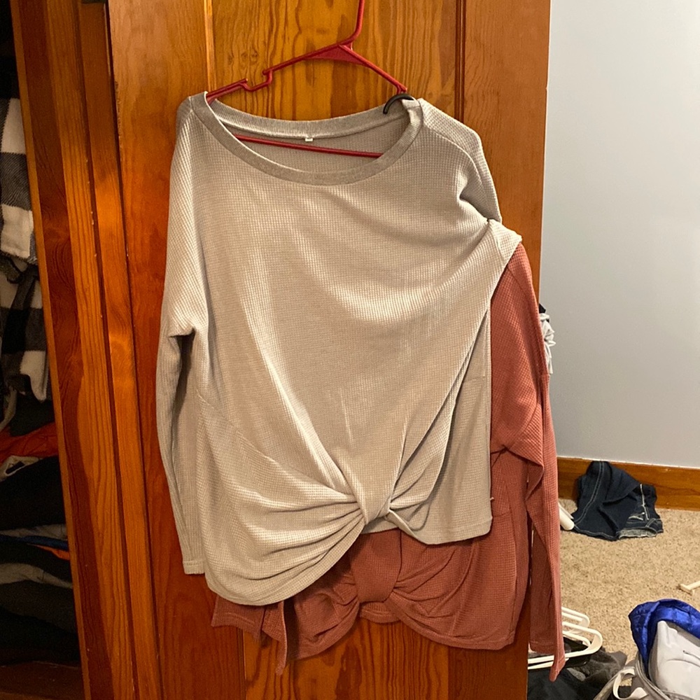Two long sleeve shirts.